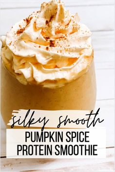 a pumpkin spice protein smoothie with whipped cream on top