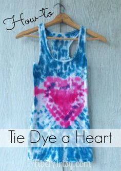 a tie dye heart tank top hanging on a wooden hanger with text overlay how to tie dye a heart