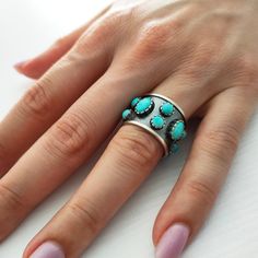 Turquoise Band Ring - Material: High Quality Solid 925 Sterling Silver - Gemstone: Turquoise - Ring Height: 14mm Turquoise makes a glorious daily companion especially for those who just want to walk through the world feeling cleansed and pure and with the free flow of communication. It provides strength, vitality, and vibrations that never cease to bring ripples of good vibes directly to your soul. For those who crave wisdom, intuition, joy, serenity, and the freedom to speak their own mind Turq Unique Turquoise Open Ring, Unique Open Turquoise Ring, Handmade Turquoise Open Ring, Southwestern Style Turquoise Ring Gift, Turquoise Open Ring Stamped 925, Turquoise Open Ring Emerald For Anniversary, Turquoise Emerald Open Ring For Anniversary, Unique Turquoise Emerald Ring For Anniversary, Turquoise Anniversary Ring