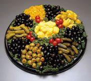 a platter filled with lots of different types of food