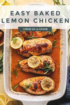 baked lemon chicken in a casserole dish with herbs and lemons on the side