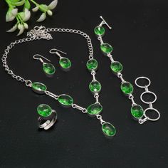 Faceted Green Amethyst Jewelry Set Necklace Bracelet Ring Earrings 925 Sterling Silver Jewelry Set Handmade Jewelry Gemstone Jewelry Set SKU:- G148 Metal:- Sterling Silver Metal Purity:- 925 Gemstone:- Green Amethyst Gemstone Color:- Green Gemstone Shape :- Oval Stone Setting :- Channel Necklace Length:- 18 Inches With Adjustable Chain Bracelet Length:- 6-8 Inches With Adjustable Chain Earrings Length:- 1.3 Inches Ring Size :- Adjustable Note We are continuously adding new products in our store. So keep coming back to see more great deals on jewelry in our Store. Amazing quality at the best price around Bulk wholesale orders are welcome on this items. Makes a great focal piece, sure to get compliments Have a great shopping with us!! Thanks for visiting our store. https://sunrisejewelshub.e Sterling Silver Jewelry With Stones For Formal Occasions, Formal Sterling Silver Jewelry With Stones, Adjustable Green Jewelry With Stone Setting, Adjustable Green Amethyst Jewelry, Fine Jewelry Green Amethyst, Green Amethyst Fine Jewelry, Formal Green Amethyst Jewelry, Silver Faceted Amethyst Jewelry, Adjustable Sterling Silver Jewelry Sets For Gifts