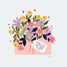 a bouquet of flowers in an envelope with a message