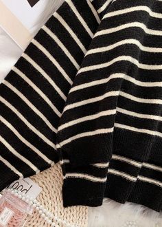 Oversized black striped knitted blouse plus size clothing o neck low high design knit tops

 Materials used: knit fabric

Measurement:One size fits all for this item. Please make sure your size doesn't exceed this size: BUST-130cm   
   
length front 55cm / 21.45"
length back 60cm / 23.4"
bust 130cm / 50.7"
Shoulder 70cm / 27.3"
Sleeve length 45cm / 17.55"



We ship worldwide.

Tracking numbers provided for all orders. Knit Sweater With Contrast Stripes, Black Horizontal Stripe Sweater For Fall, Black Crew Neck Trendy Cardigan, Black Horizontal Stripe Winter Sweater, Oversized Striped Soft Knit Top, Knit Crew Neck Tops With Striped Sleeves, Black Casual Sweater With Contrast Stripes, Casual Black Sweater With Contrast Stripes, Casual Striped Ribbed Cardigan