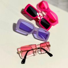 4 High Quality, Brand New Girl Sunglasses Pink, Bubble Gum, Rose Pink And Violet Get Your Summer Sunglasses To Uplift Your Summer Outfits You Don’t Need To Pay For Expensive Sunglasses When You’re Going To Lose Them Somewhere. Instead Buy This 4 Pairs For An Unbeatable Price And Look Cute All Summer Long! Pink Glass Sunglasses For The Beach, Pink Glass Sunglasses For Beach, Purple Polarized Glass Sunglasses, Pink Square Frame Sunglasses For Beach, Purple Sunglasses With Uv Protection And Glass Material, Pink Sunglasses For Summer Party, Summer Party Sunglasses With Glass Lenses, Trendy Purple Glass Sunglasses, Summer Party Sunglasses With Glass