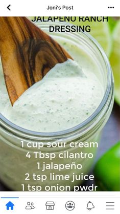 the recipe for jalapeno ranch dressing in a jar with a wooden spoon