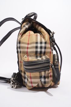 Brand: Burberry Style: Backpack Mini Size: Mini Width: 17cm Height: 23cm Depth: 8.5cm Handle Drop: 39 Exterior Condition: New Interior Condition: New Exterior Colour: Check Interior Colour: Black Hardware Colour: Silver Serial Code: 4075972 Manufactured In: Romania Comes With: Dustbag Delivery 5-8 or 10-15 working days Please note that during high season and Sale period, delivery times may be affected We accept payment with a Credit card, Debit card, or PayPal.Note: Our Items are totally New High quality Brand Inspired Refurbished. Please make sure you are well aware of it before buying any of the Item.T&C's Apply in case of refunds. Please send us message on below chat to confirm availability. We will send the Refurbished Model in case you place an order with us. Enjoy Shopping. Always Se Burberry Backpack, Burberry Style, Interior Colour, Backpack Tote Bag, School Bags For Kids, Designer Backpacks, Black Hardware, Kids Bags, Handbag Backpack