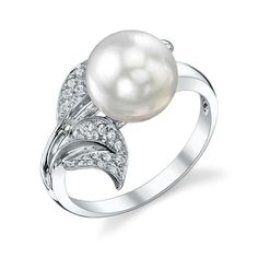 This gorgeous pearl ring is mounted with a beautiful White South pearl with exceptional luster. The ring is comprised of the highest quality 18K gold, in either white or yellow gold, and is adorned with sparkling SI quality diamonds. This ring is available in ring sizes 4.0 through 9.0. All pearl rings are approved by our staff of GIA pearl experts and come packaged in a beautiful pearl jewelry box, creating an elegant presentation. All pearl rings come with a certificate of authenticity, verify White Gold Pearl Ring, Traditional Engagement Rings, Gold Pearl Ring, Geode Earrings, Diamond Eternity Ring, Pearl Jewelry Sets, Sea Pearl, Eternity Ring Diamond, Sea Pearls