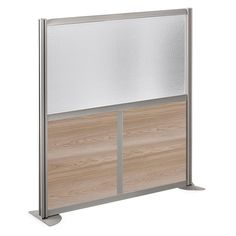 an office partition with sliding doors and wood paneling on the sides, in front of a white background