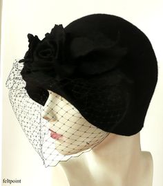 "Black veil hat,Cloche Felted Hat, felt hat, Cloche Hat, black Hat, Art Hat Black Hat La belle epoque Art Deco 1920s hat Art Hats Black hat cloche 1920's hat black roses Hats&Caps Accessories Handmade Great, very flattering black hat with black veil! Adapts to the head ! Special and unique ! Sophisticated and elegant ! I can make this hat in other colors and sizes. Made just for you To measure your head: Using a tape measure, go around head about 1\" above eyebrows in front and include the l Black Winter Wedding Fascinator, Black Gatsby Style Hats For Evening, Winter Wedding Black Fascinator, Black Cloche Hat For Races, Black Cloche Hat For Church, Black Cloche Costume Hat For Church, Black Brimmed Mini Hats For Vintage Events, Black Cloche Church Hat, Black Winter Fascinator Hat