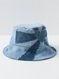 a blue hat sitting on top of a white table