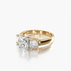 an engagement ring with two princess cut diamonds