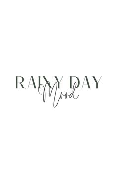 the words rainy day are written in black ink on a white background with a handwritten font