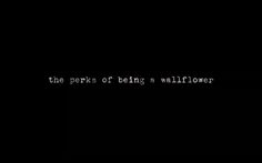 the perks of being a wallflower text on a black background with white letters