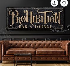 the smiths prohibition bar and lounge sign is displayed on a wall above a leather couch