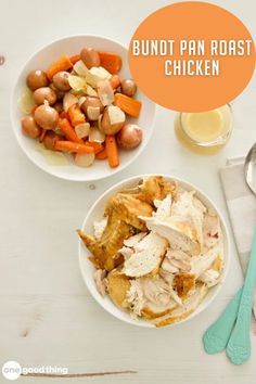 a bowl of chicken, carrots and potatoes on a table