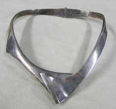 "Sterling silver hinged collar necklace from Mexico. Stamped TA-85 Mexico 925. The Front is 1 1/8\" tall. A spring in the center back allows you to open the necklace to get it on your neck. This spring is strong and works well. The inside of the necklace measures 15\". Good condition with natural patina. NK-7" Coral Ring, Black Onyx Ring, Sterling Silver Cuff Bracelet, Onyx Ring, Ring Fit, Sterling Silver Cuff, Silver Cuff Bracelet, Photo Bracelet, Silver Cuff