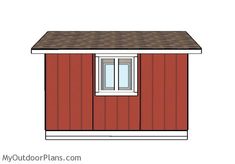 a small red shed with a brown roof and two windows on the side of it