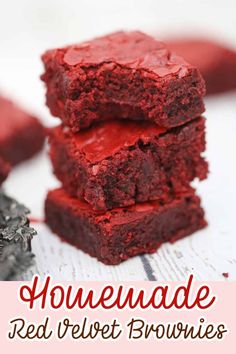 three red velvet brownies stacked on top of each other with the words, homemade red velvet brownies