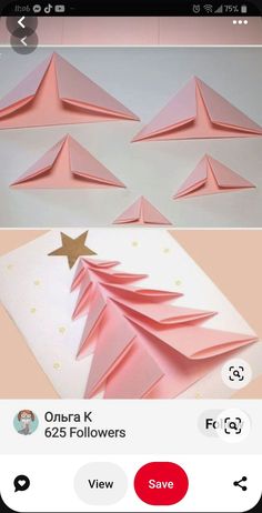 an iphone screen showing how to make origami christmas trees with pink paper and gold stars