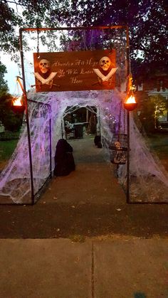 an entrance to a halloween themed home