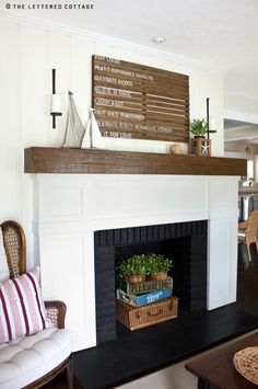 a living room filled with furniture and a fire place covered in plants on top of a mantel