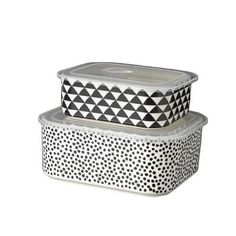 two containers with black and white designs on them