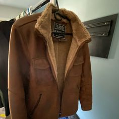 Size Large. Fits Snug. Very Warm. Perfect Condition. Feels Great Like Real Suede. Winter Faux Leather Jacket With Pockets, Brown Leather Jacket With Zipper For Cold Weather, Winter Shearling Outerwear With Zipper Closure, Brown Leather Jacket With Faux Fur Lining For Winter, Casual Leather Outerwear With Faux Fur Lining, Faux Leather Outerwear With Faux Fur Lining, Brown Leather Jacket With Fleece Lining For Cold Weather, Cold Weather Shearling Outerwear With Pockets, Leather Outerwear With Pockets For Cold Weather