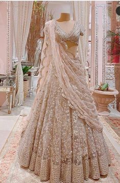 a wedding dress on display in a store