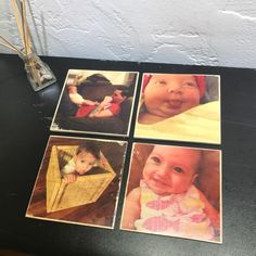 four pictures of babys are on the table