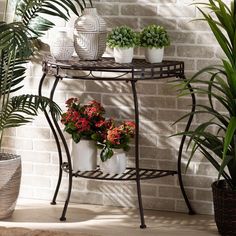 Baxton Studio Laraine Modern and Contemporary Black Metal Outdoor Console Table FredCo Decorate With Plants, Outdoor Console Table, Iron Console, Iron Console Table, Black Console Table, Contemporary Console Table, Modern Plant Stand, Metal Console Table, Outdoor Side Tables