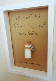 there is a small glass bottle with a key in it that says those who don't believe in magic will never find it