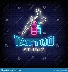 tattoo studio logo with neon lights and tools on the brick wall stock photo image of