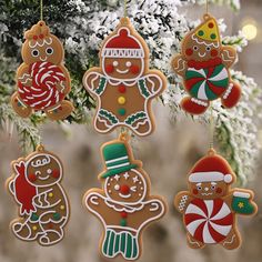 gingerbread christmas ornaments hanging from a tree