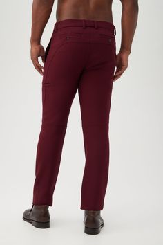 Your favorite slim-fit pant silhouette just got a new look with improved details, a comfortable fit, and polished style. Featuring side slash pockets, side welt pockets, and tailored seaming at the knees, this is the fresh update you need in your year-round wardrobe. Side slash pockets Zip and hook front closure Side welt pockets Back welt pockets with button closure Back seaming detail Tailored seaming at knees Model is 6'1", wearing size 32 See Men's Size Guide Made in USA FABRIC: Hi-Line Suit Round Wardrobe, Bordeaux Color, Polished Style, Bryant Park, Fabric Making, Polyester Yarn, Slim Fit Pants, Trina Turk, Welt Pockets