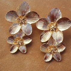 These Earrings Are Big, Bold, Impossible To Miss! These Gold Tone Flowers Are An Easy Way To Jazz Up Any Outfit. From Top To Bottom These Earrings Measure About 2.25". They Come With Clear Rubber Disc Backs. They Are In Excellent Condition, Are Brand New, And Have Never Been Worn. Gold Flower Earrings For Summer Parties, Gold Flower Charm Earrings For Summer, Summer Gold Jewelry With Flower Decoration, Gold Flower Earrings For Pierced Ears, Summer Season, Gold Drop Flower Earrings For Summer, Gold Flower Earrings For Summer, Gold Metal Flower Earrings For Summer, Gold Earrings With 3d Flowers For Spring, Summer Flower Shaped Metal Earrings