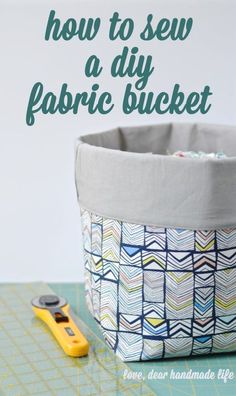 a sewing basket with the words how to sew a diy fabric bucket