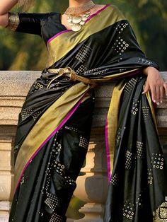 Our gorgeous black zari weaving silk reception wear saree with blouse. Crafted in a striking black color with intricate zari weaving work, this saree exudes elegance and grace. The set includes a matching silk blouse with zari weaving work to complete your traditional look. The saree measures 5.50 meters and the blouse material is unstitched, allowing you to customize the fit according to your measurements.
This saree set includes the luxurious silk fabric that drapes beautifully, making you the Engagement Gown, Lehenga Crop Top, Lehenga Choli Wedding, Floral Lehenga, Party Wear Lehenga Choli, Reception Gown, Bollywood Lehenga, Cocktail Wear, Party Wear Lehenga