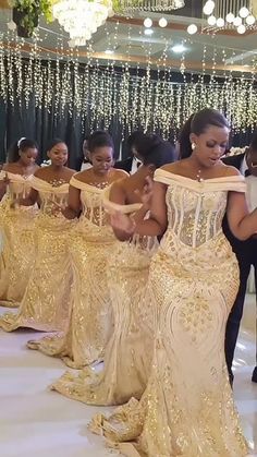 the bridesmaids are getting ready to walk down the aisle at their wedding reception