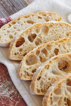 several pieces of bread sitting on top of a towel