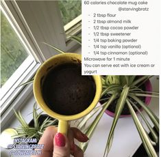 a person holding a yellow cup with chocolate in it and texting about the recipe