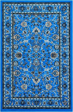 a blue rug with black and white designs on it