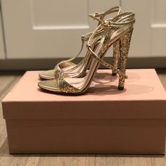 Golden Colored, Really Comfortable. Luxury Miu Miu Heels For Summer, Luxury Miu Miu Summer Heels, Luxury Miu Miu Heels For Formal Occasions, Designer Miu Miu Heels With Heel Strap, Miu Miu Luxury Heels With Ankle Strap, Luxury Miu Miu Heels For Spring, Gold Heels With Leather Sole For Gala, Elegant Miu Miu Ankle Strap Sandals, Gold Heels With Leather Sole For Party