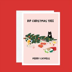 a christmas card with an image of a cat sitting on the ground next to a tree