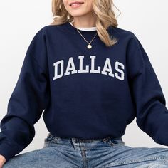 This Dallas sweatshirt is the perfect way to embrace the iconic Dallas skyline. Crafted with premium materials, this cozy Dallas crewneck offers both comfort and a touch of casual style. Whether you're taking in the city's impressive architecture, enjoying local attractions, or simply expressing your love for Dallas, our Dallas shirt is the ideal choice. Ideal for most situations, a unisex heavy blend Texas crewneck sweater is pure comfort. These garments are made from polyester and cotton. This combination helps designs come out looking fresh and beautiful. The collar is ribbed knit, so it retains its shape even after washing. There are no itchy side seams on these sweaters. - 50% cotton, 50% polyester - Medium-heavy fabric (8.0 oz/yd² (271.25 g/m - Loose fit - Sewn-in label Fit Note: If Trendy French Terry Crew Neck Tops, Relaxed Fit Long Sleeve Sweater For Casual Wear, Long Sleeve Sweater With Ribbed Cuffs For Campus, Collegiate Crew Top In French Terry, College Fleece Sweatshirt Athleisure Style, College Fleece Sweatshirt In Athleisure Style, Casual Crew Neck Hoodie For Campus, College Athleisure Fleece Sweatshirt, Casual Fall Campus Sweatshirt