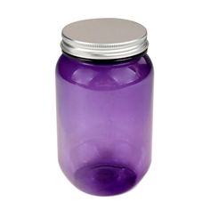 a purple glass jar with a silver lid