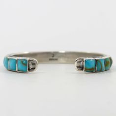 Sterling Silver Cuff Bracelet set with a Row of Turquoise. .25” Cuff Width5.375” Inside Measurement, plus .875” opening(6.25" Total Circumference - Small-Medium) Zuni Jewelry, Concho Belt, Navajo Jewelry, Native Jewelry, Turquoise Cuff, Sterling Silver Cuff Bracelet, Sterling Silver Cuff, Pendant Rings, Silver Cuff Bracelet