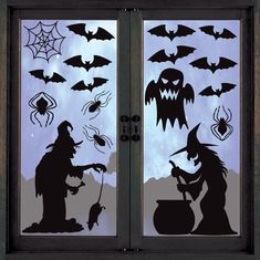 the silhouettes of witches and bats are shown through a glass door with frosting