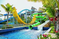 a water slide in the middle of a swimming pool