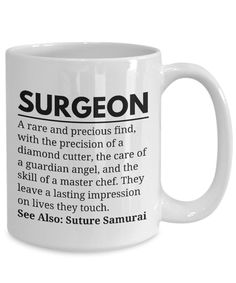 a white coffee mug with the words surgeon on it